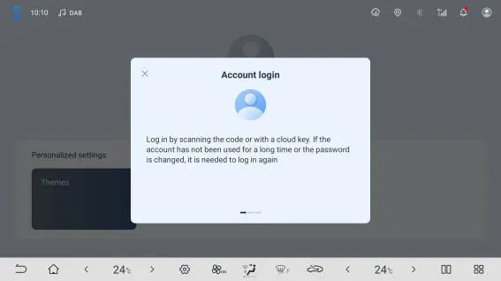 Head-unit dialog “Account login” stating that the user can log in by scanning the code or with a cloud key, and that logging in again is needed if the account has not been used for a long time or the password has changed.
