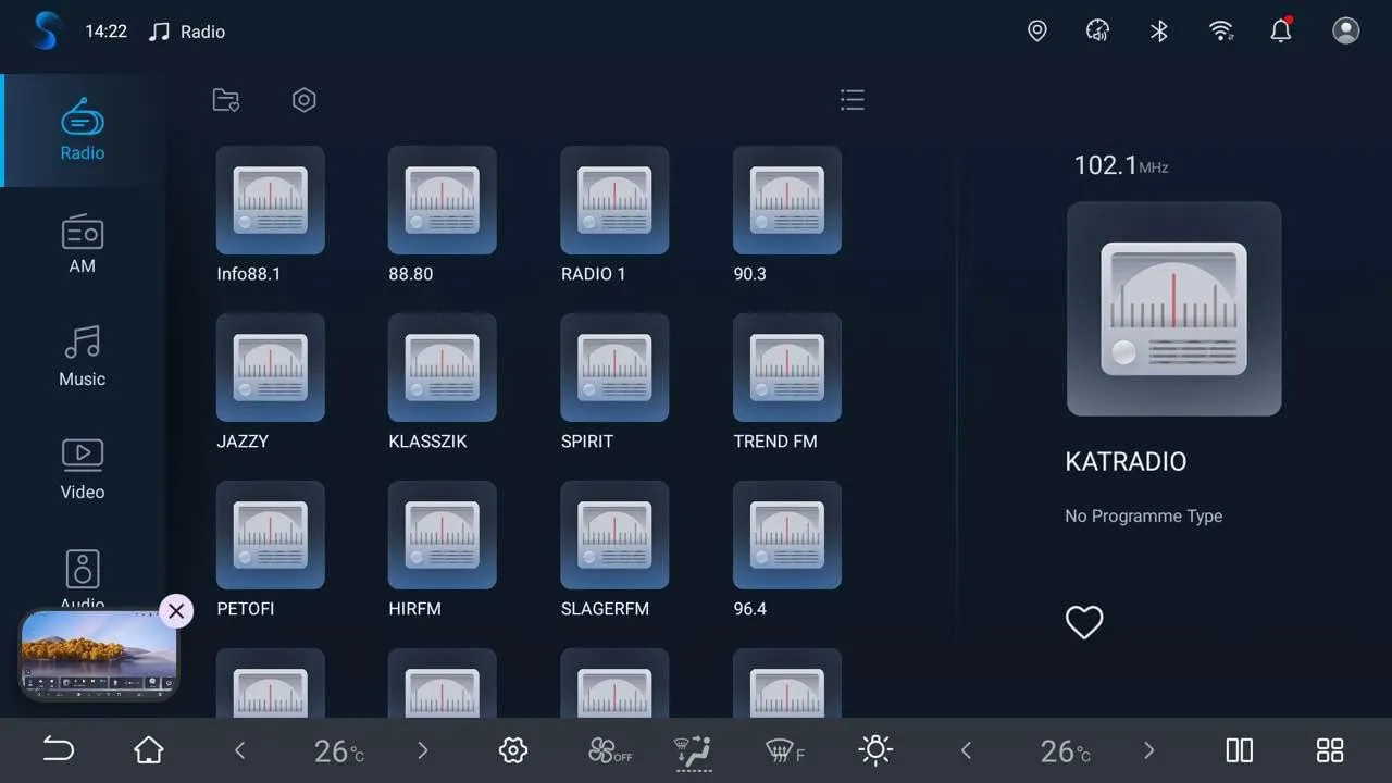 Head-unit radio screen with a left tab bar (Radio, AM, Music, Video, Audio), a grid of stored FM stations including Info88.1, 88.80, RADIO 1, 90.3, JAZZY, KLASSZIK, SPIRIT, TREND FM, PETOFI, HIRFM, SLAGERFM and 96.4, and the currently tuned station 102.1 MHz KATRADIO on the right.