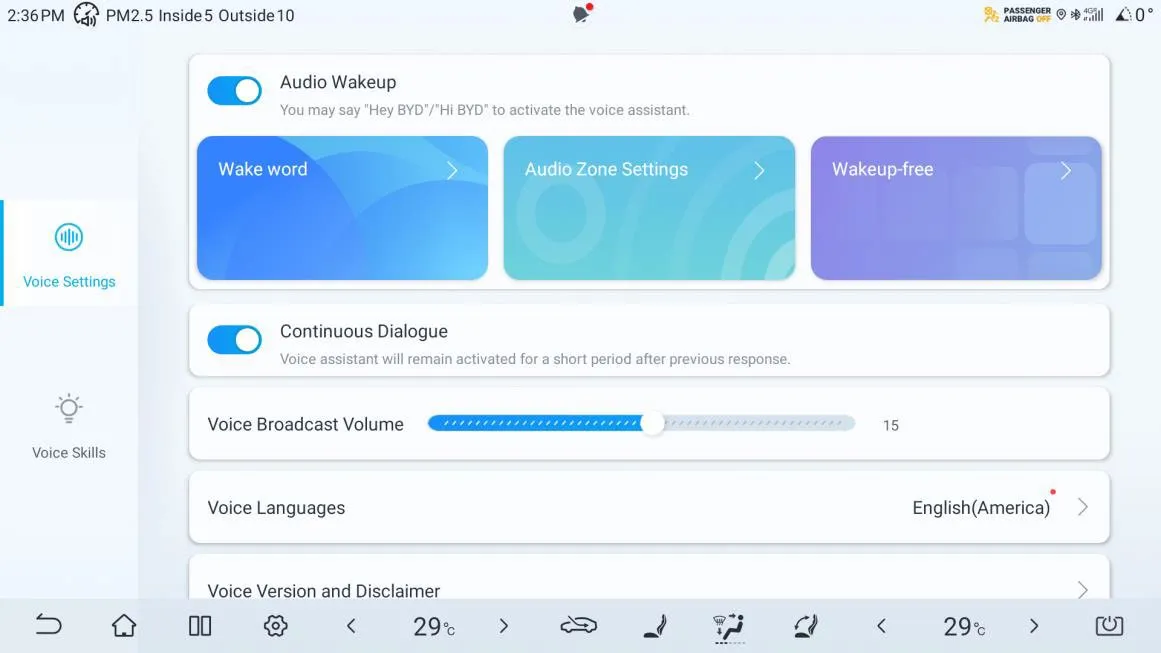 Voice Settings on the head unit: Audio Wakeup switched on with the hint You may say ‘Hey BYD’/‘Hi BYD’ to activate the voice assistant, tiles for Wake word, Audio Zone Settings and Wakeup-free, a Continuous Dialogue toggle, Voice Broadcast Volume set to 15 and Voice Languages set to English (America).