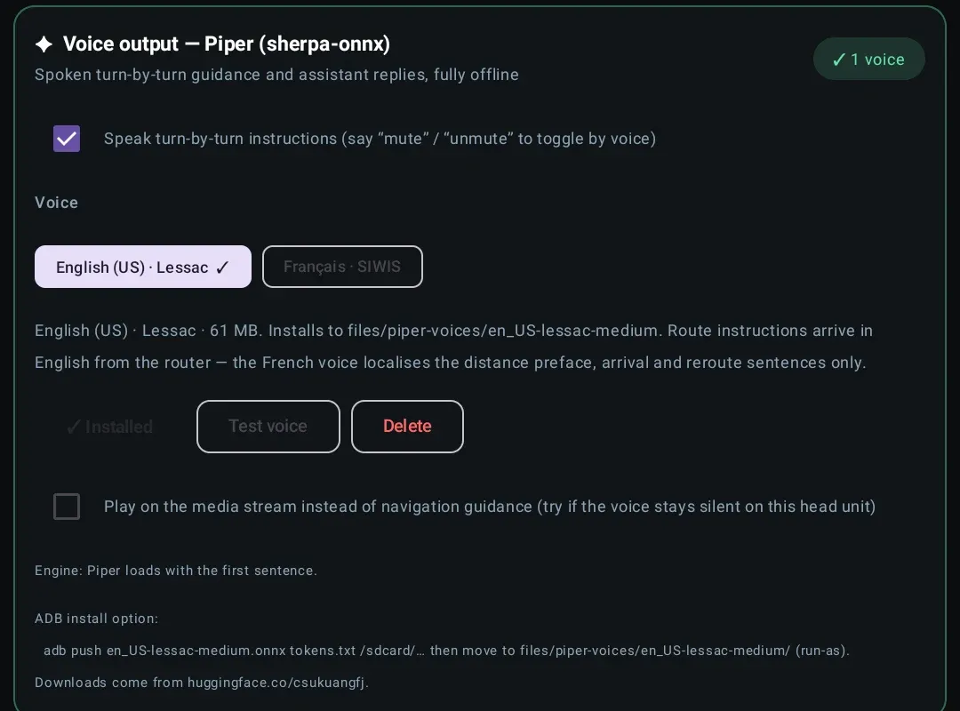 The Voice output card in Settings: Piper via sherpa-onnx, fully offline, with a checkbox for speaking turn-by-turn instructions, an English US Lessac voice installed at 61 MB, a French SIWIS voice available, and Test voice and Delete buttons